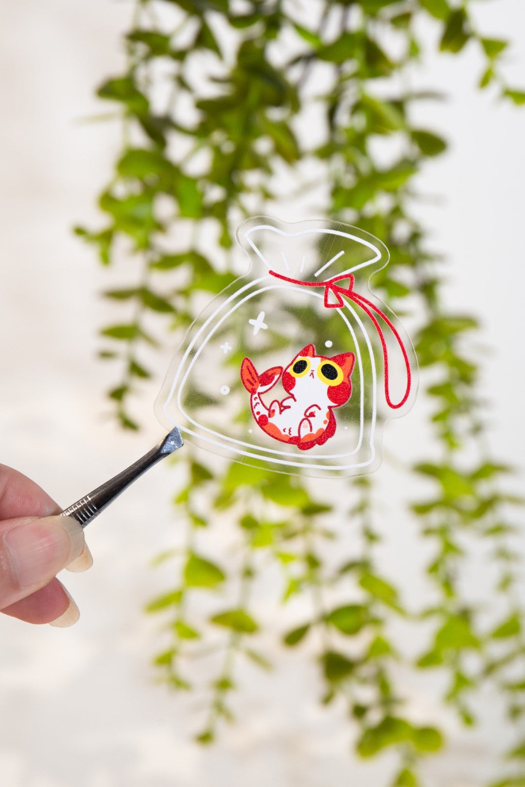 Cleared Vinyl Sticker | Koi Cat Bag | 3 inch | Waterproof & Fade-Resistant |