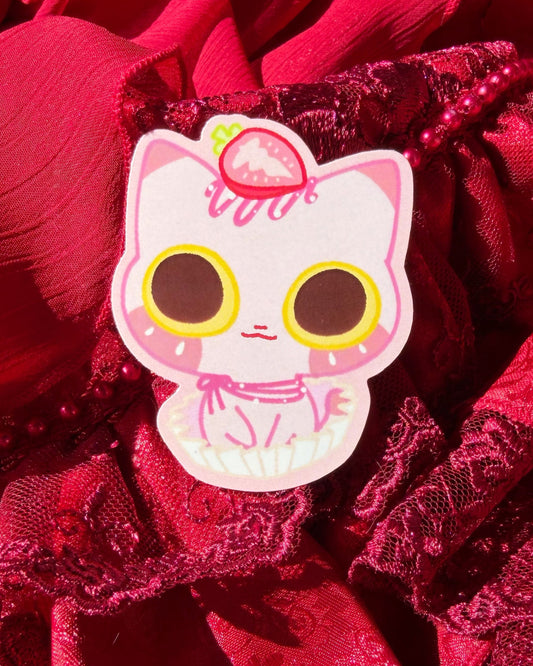 Cartoon character sticker on a red textured fabric background